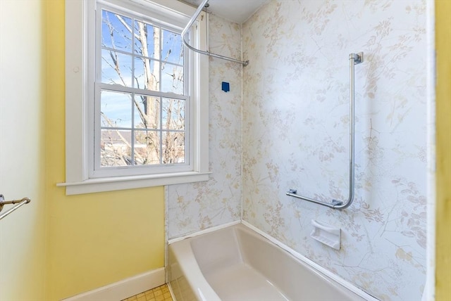 bathroom with shower / tub combination