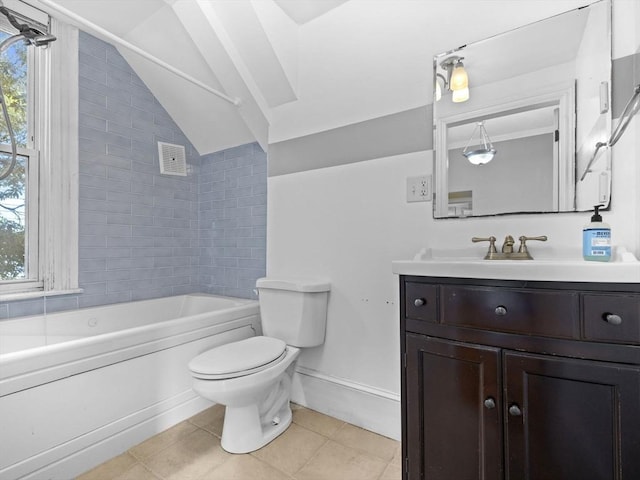 bathroom with a tub to relax in, toilet, vanity, and tile patterned flooring