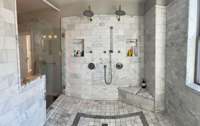 full bathroom with a tile shower