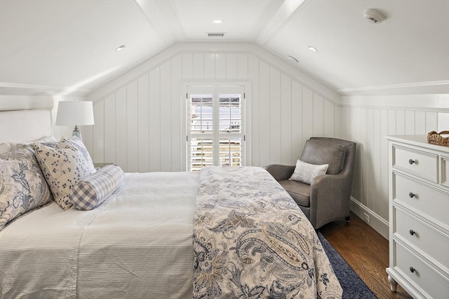 bedroom with dark hardwood / wood-style floors and vaulted ceiling