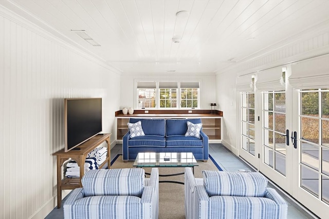 living room with french doors, wooden ceiling, and ornamental molding