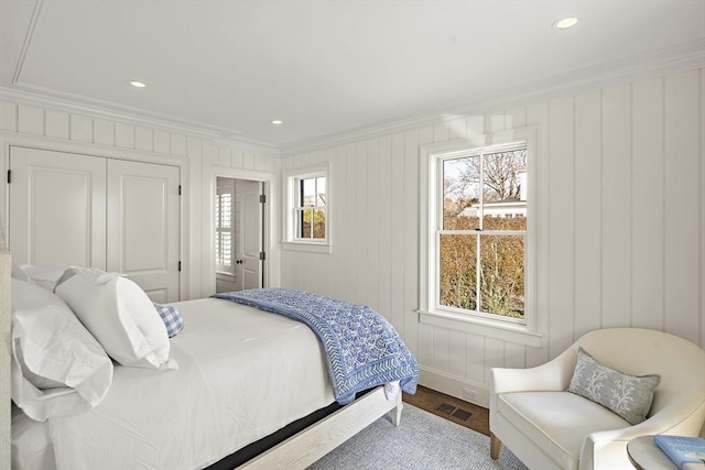 bedroom featuring crown molding