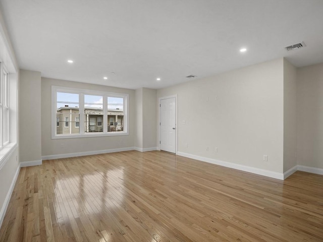 unfurnished room featuring light hardwood / wood-style flooring