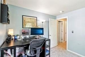 84 E Ave, Lowell, MA 01854 - office with light colored carpet and baseboards