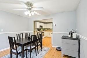 84 E Ave, Lowell, MA 01854 - dining room with ceiling fan and light wood finished floors