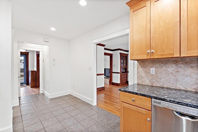 kitchen with backsplash, stainless steel dishwasher, baseboards, recessed lighting, and light tile patterned flooring