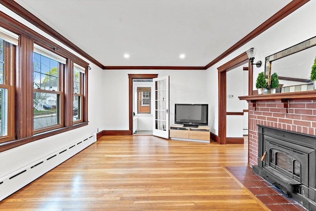 unfurnished living room featuring light wood finished floors, recessed lighting, baseboards, a baseboard radiator, and ornamental molding
