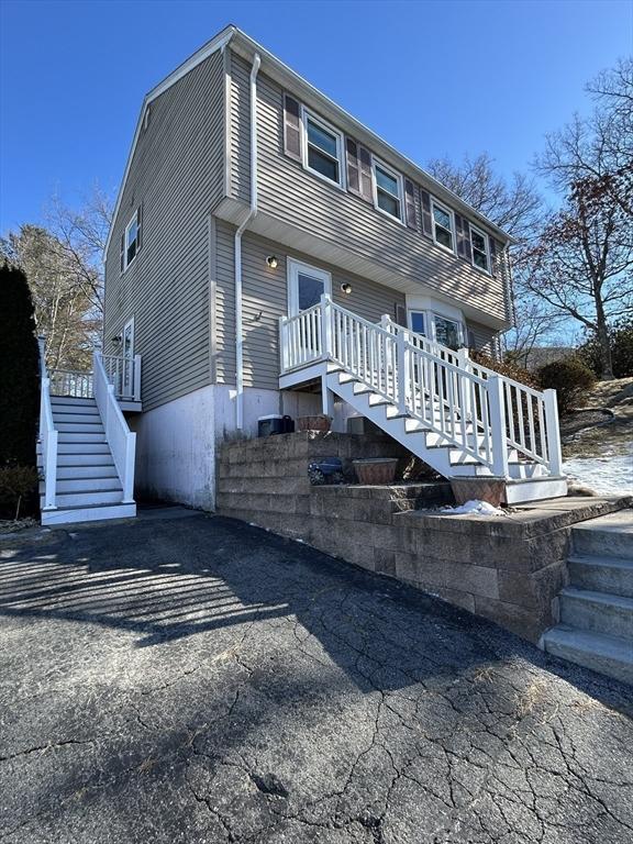 view of front of home with a wooden deck