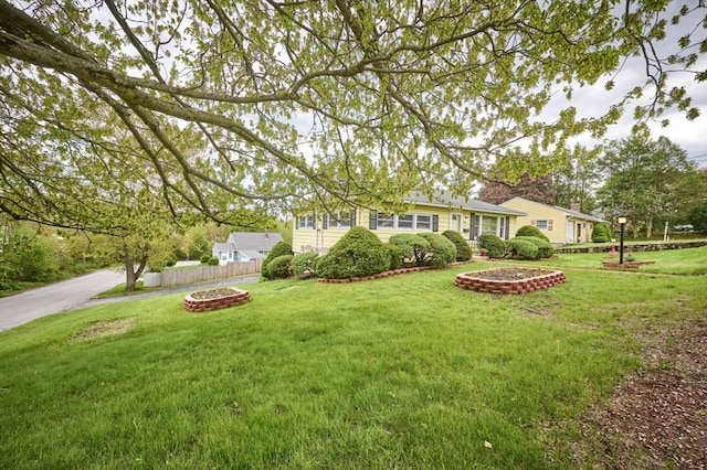 view of yard with an outdoor fire pit
