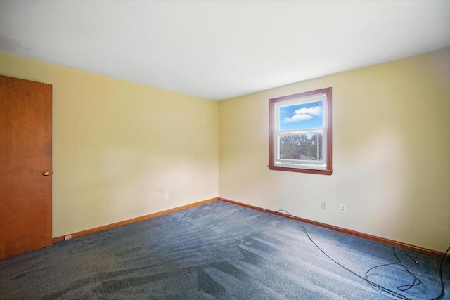 69 Michael St, Ludlow, MA 01056 - unfurnished room featuring baseboards and dark carpet