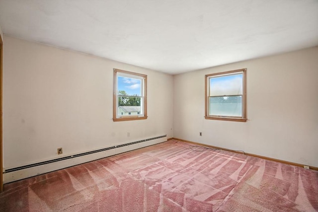 69 Michael St, Ludlow, MA 01056 - unfurnished room featuring a baseboard heating unit and light colored carpet