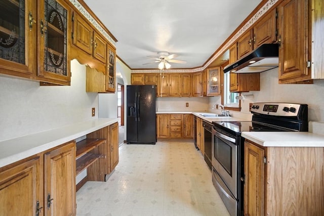 69 Michael St, Ludlow, MA 01056 - kitchen featuring electric stove, black refrigerator with ice dispenser, under cabinet range hood, light flooring, and brown cabinetry