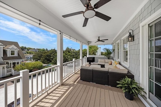 33 Central Ave Unit 12, Scituate, MA 02050 - deck with an outdoor living space and a ceiling fan