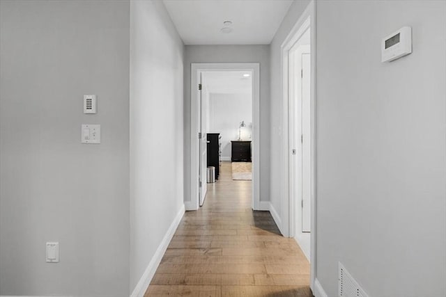 33 Central Ave Unit 12, Scituate, MA 02050 - hallway with wood finished floors and baseboards