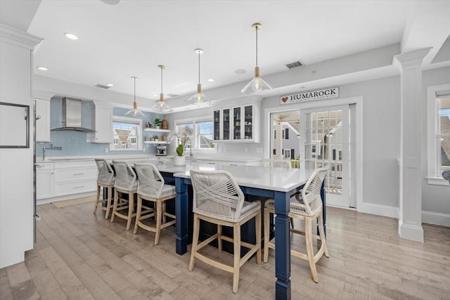 33 Central Ave Unit 12, Scituate, MA 02050 - dining area with light wood-style flooring and recessed lighting