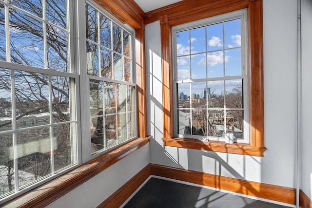21 Alpine Unit 2Nd & 3Rd, Boston, MA 02119 - unfurnished sunroom with a view of skyline
