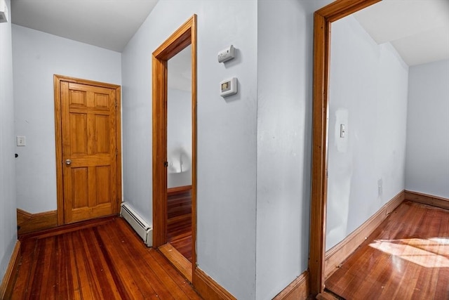 21 Alpine Unit 2Nd & 3Rd, Boston, MA 02119 - corridor with a baseboard heating unit and dark wood-type flooring
