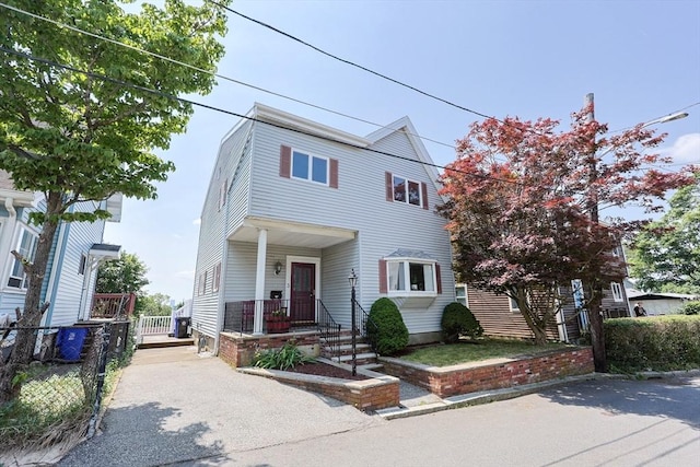3 Nira St, Malden, MA 02148 - view of front of house with covered porch and asphalt driveway