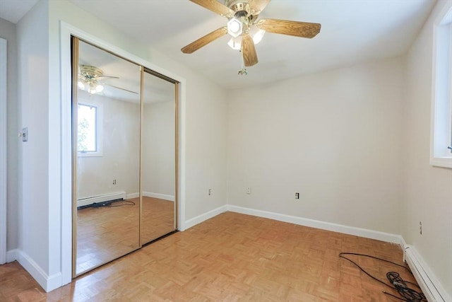 3 Nira St, Malden, MA 02148 - unfurnished bedroom featuring a baseboard heating unit, a closet, and ceiling fan