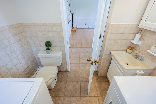 3 Nira St, Malden, MA 02148 - bathroom with tile walls, vanity, tile patterned floors, and wainscoting