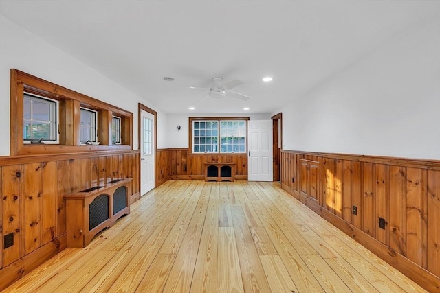 680 Old Connecticut Path, Framingham, MA 01701 - empty room with a wainscoted wall, light wood-style floors, ceiling fan, wooden walls, and recessed lighting