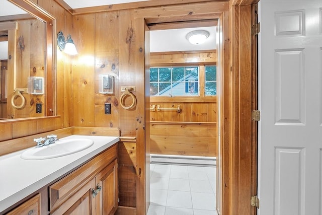 680 Old Connecticut Path, Framingham, MA 01701 - bathroom featuring wood walls, a baseboard radiator, vanity, and tile patterned flooring