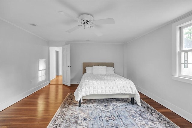 680 Old Connecticut Path, Framingham, MA 01701 - bedroom with wood finished floors, crown molding, baseboards, and a ceiling fan