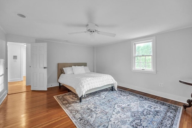 680 Old Connecticut Path, Framingham, MA 01701 - bedroom with wood finished floors, ornamental molding, baseboards, and a ceiling fan