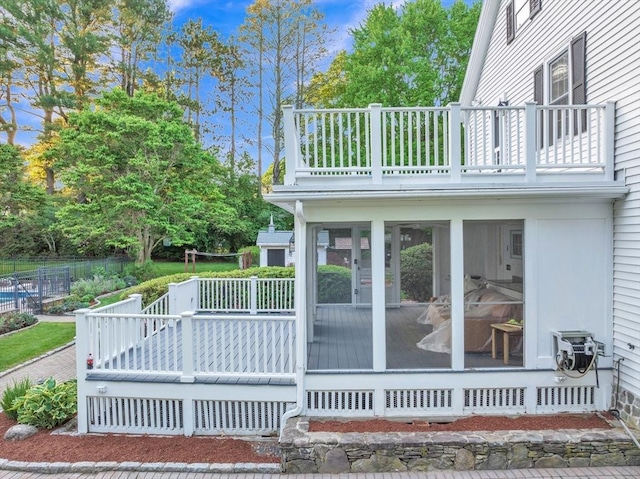 680 Old Connecticut Path, Framingham, MA 01701 - wooden deck featuring a sunroom