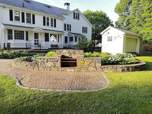680 Old Connecticut Path, Framingham, MA 01701 - back of property with an outbuilding, a porch, a yard, and a chimney