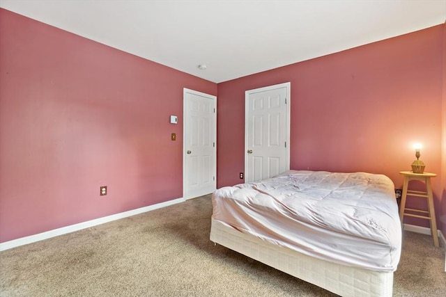 bedroom featuring carpet