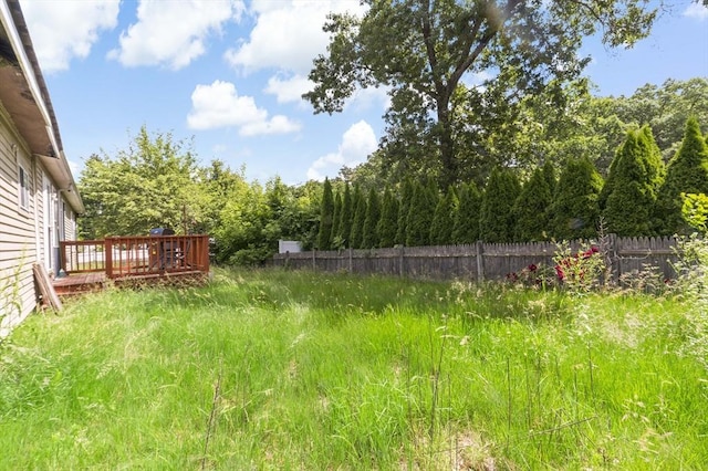 view of yard with a deck