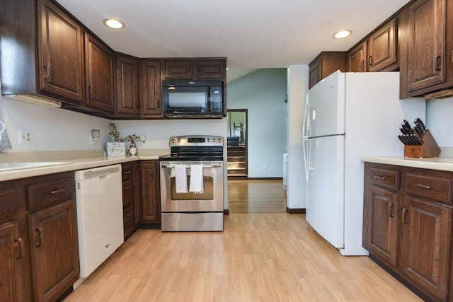 133 E Main St, Norton, MA 02766 - kitchen featuring white appliances, light wood-style floors, recessed lighting, dark brown cabinetry, and light countertops