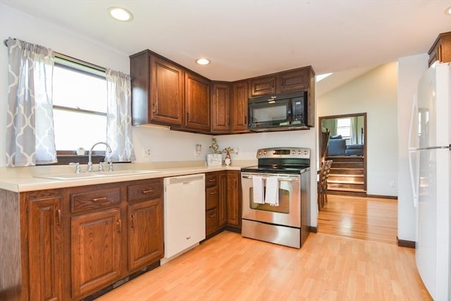 133 E Main St, Norton, MA 02766 - kitchen with white appliances, a sink, light wood-style floors, recessed lighting, and light countertops