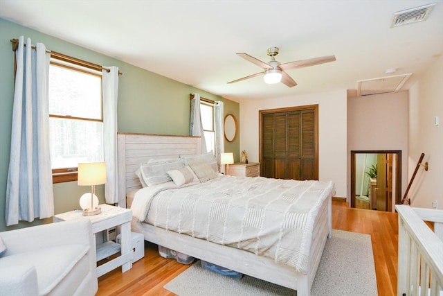 133 E Main St, Norton, MA 02766 - bedroom featuring a closet, light wood finished floors, and ceiling fan