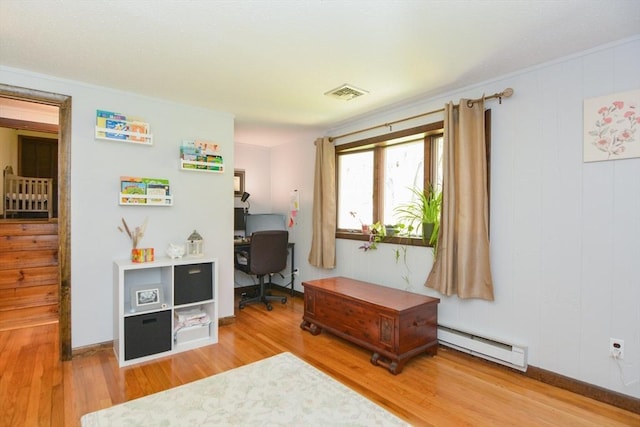 133 E Main St, Norton, MA 02766 - office featuring a baseboard heating unit, light wood finished floors, and baseboards