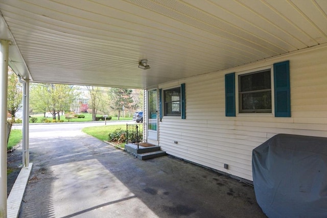 133 E Main St, Norton, MA 02766 - view of patio featuring a carport and a grill