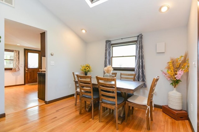 133 E Main St, Norton, MA 02766 - dining room featuring light wood finished floors, lofted ceiling, baseboards, recessed lighting, and a skylight