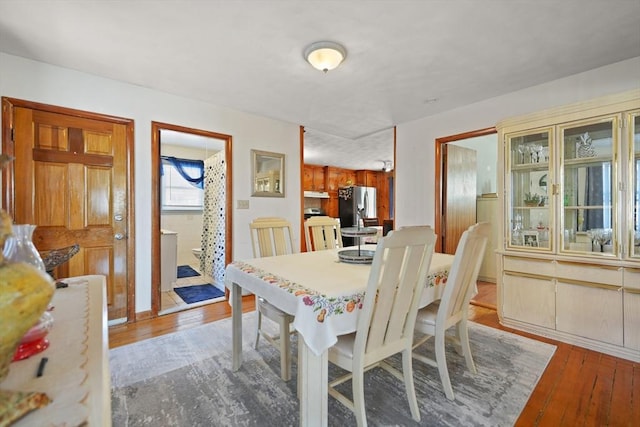 dining room featuring light hardwood / wood-style flooring