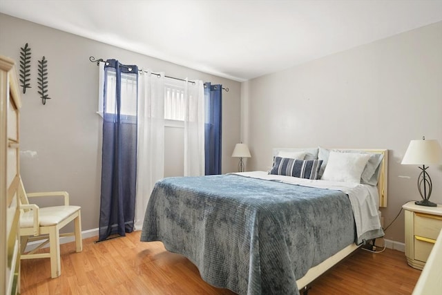 bedroom featuring hardwood / wood-style floors