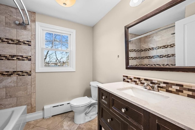 bathroom featuring tasteful backsplash, a baseboard heating unit, toilet, tile patterned floors, and vanity