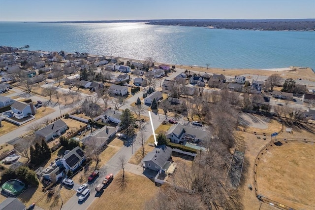 bird's eye view featuring a residential view and a water view