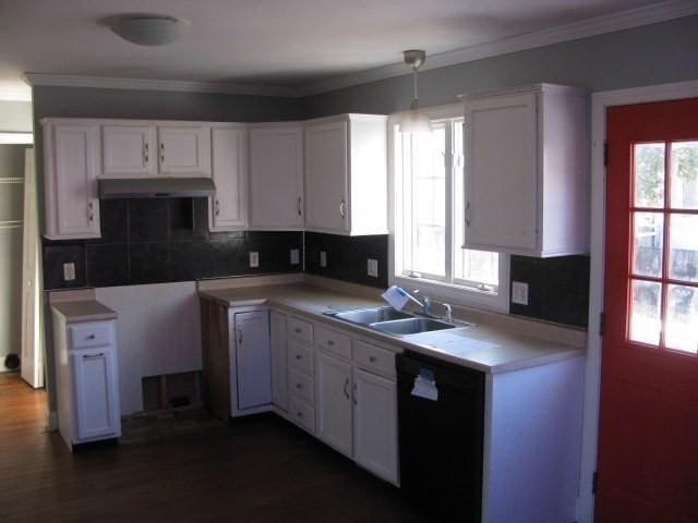 kitchen with white cabinets, decorative light fixtures, and sink