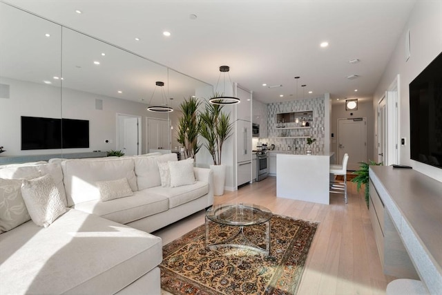 living room with light hardwood / wood-style floors