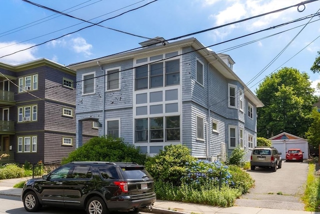 50-52 Chilton St, Cambridge, MA 02138 - view of front of property featuring an outbuilding