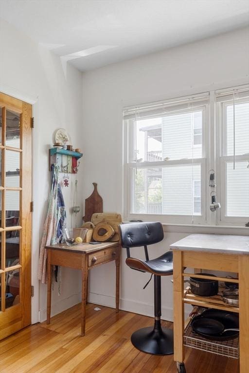 50-52 Chilton St, Cambridge, MA 02138 - dining space featuring light wood-style flooring and healthy amount of natural light