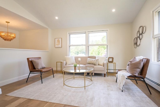 67 Paris Ave, Worcester, MA 01603 - living room featuring wood finished floors, lofted ceiling, a chandelier, baseboards, and recessed lighting