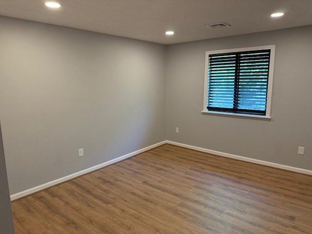 100 Cass Ave Unit B20, Dracut, MA 01826 - spare room with wood finished floors and recessed lighting