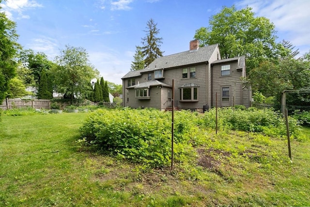 20 Johnson Rd, Andover, MA 01810 - rear view of property featuring a chimney and roof with shingles