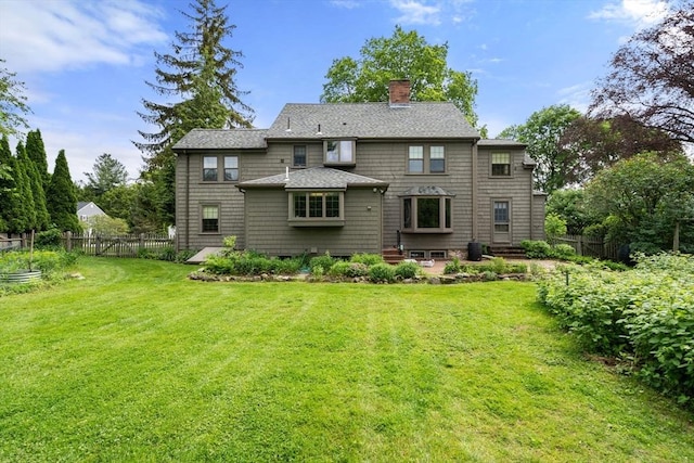 20 Johnson Rd, Andover, MA 01810 - back of house featuring a chimney and a shingled roof